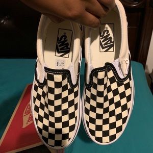 Vans black and white classic slip on